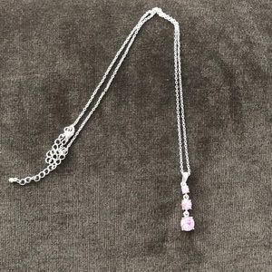 Pink stone necklace.